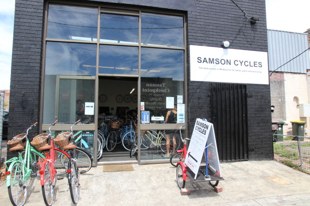 Samson Cycles&rsquo; shopfront faces a short stretch of mixed commercial roadway in inner city Melbourne. There&rsquo;s a railway line blocking the street at one end, with a busy bike path running along it and the busy Sydney Road at the other, upon which there&rsquo;s another bike shop 100 metres away.
